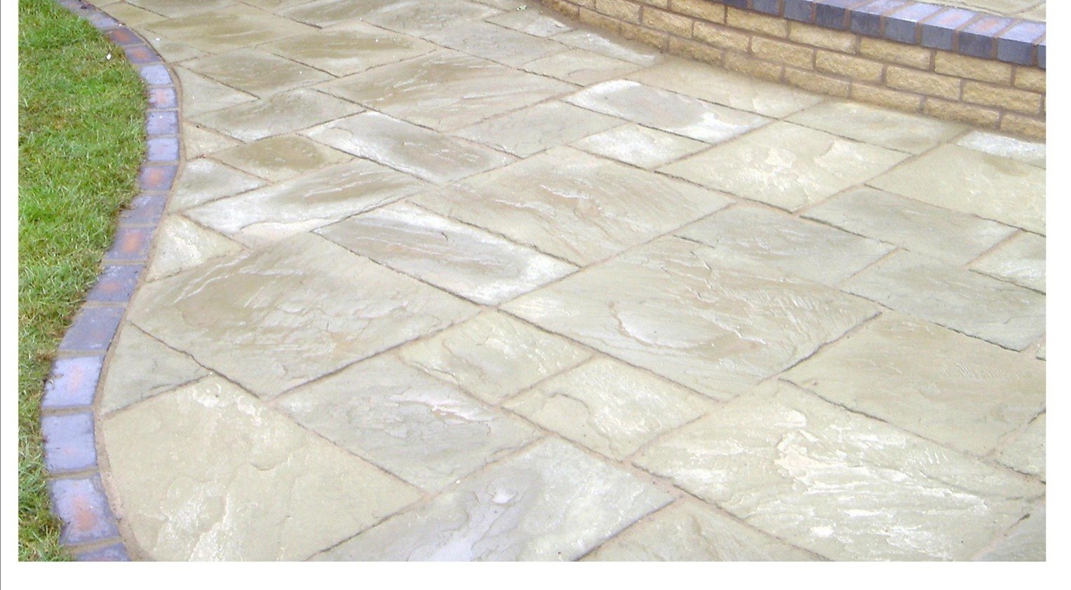 Completed sandstone garden patio in Castle Bromwich